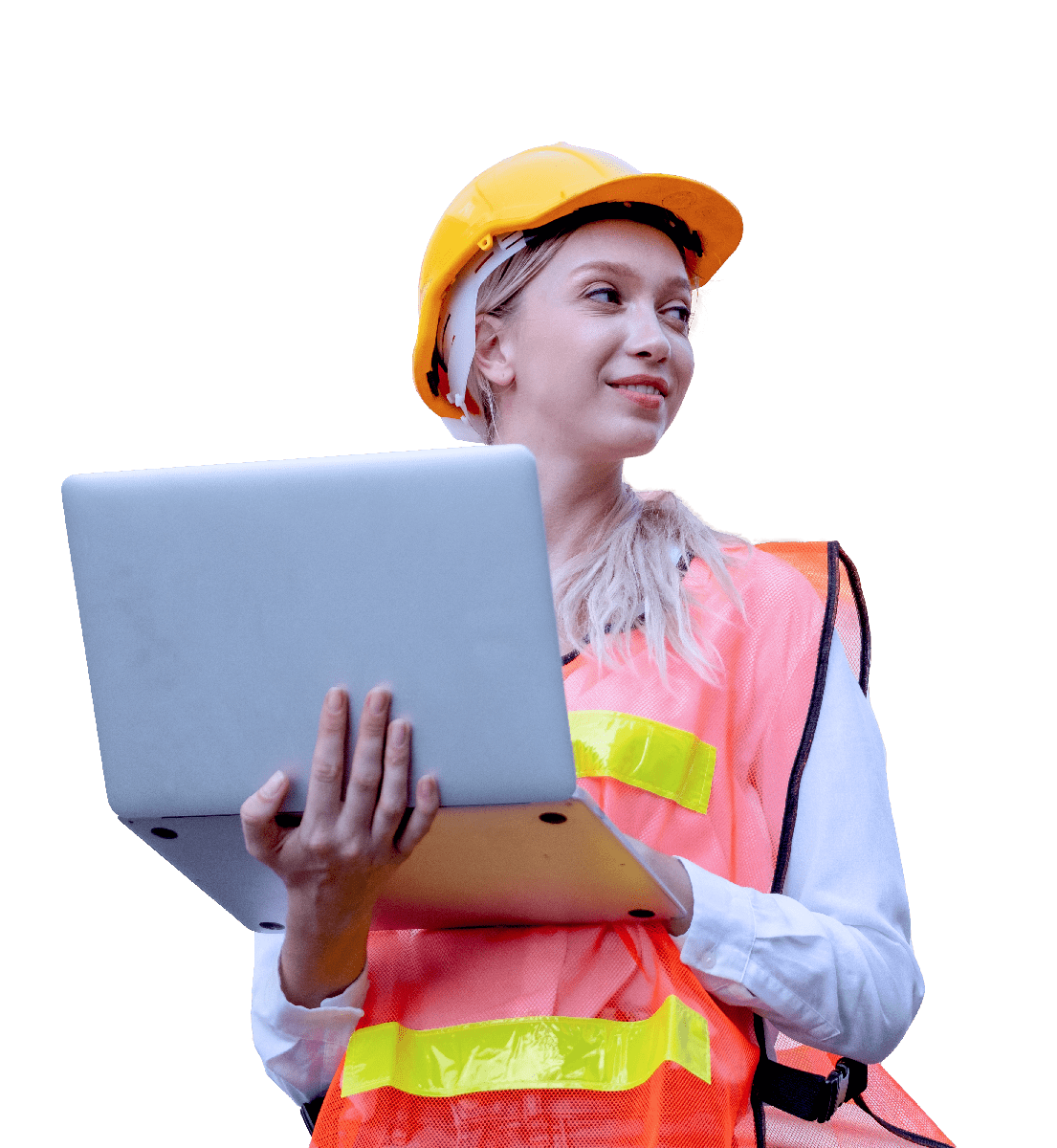 A woman in a hardhat and safety vest holding an open laptop.