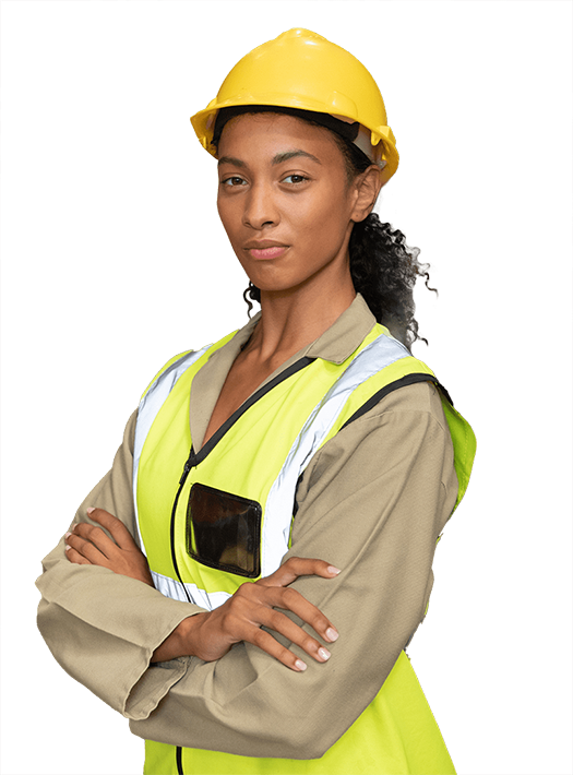 A woman wearing a hard hat and safety vest with her arms crossed.