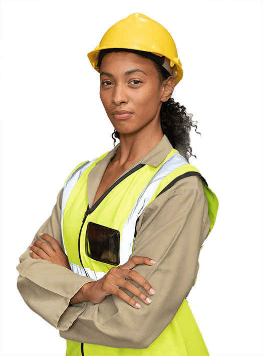 A woman with a hard hat and safety vest with her arms folded.